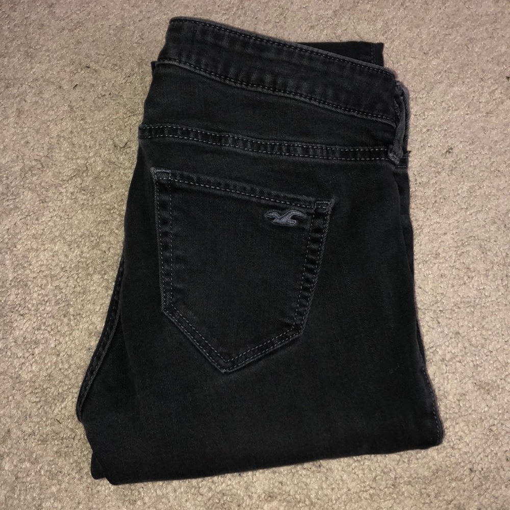 Black Faded washed jeans with rips in the knees